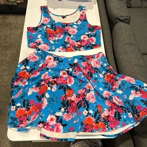 Torrid. Size 3. 2 piece crop tank top and skirt combo. Blue with floral print.
